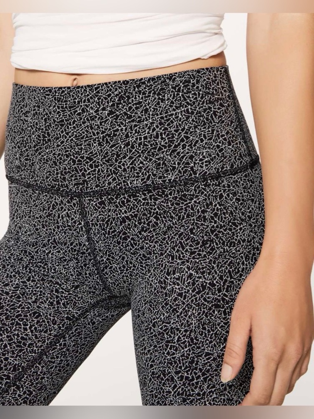 Lululemon Wunder Under Hi-Rise crops "Crackle Jacquard Black White" pattern.